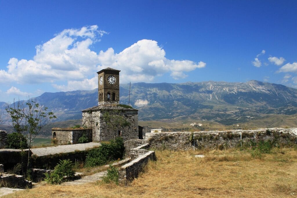 Clock tower of Gjirokastër Castle with mountain views in southern Albania