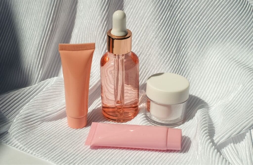 Minimalist flatlay of skincare essentials with soft natural lighting