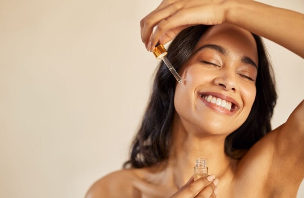 Woman applying targeted serum treatment on her face for specific skincare concerns