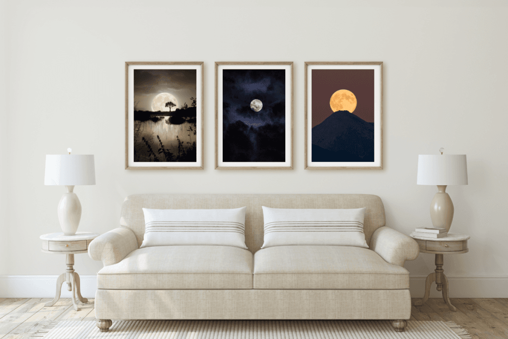 gallery wall with three framed art prints above a neutral sofa – feminine home decor inspiration