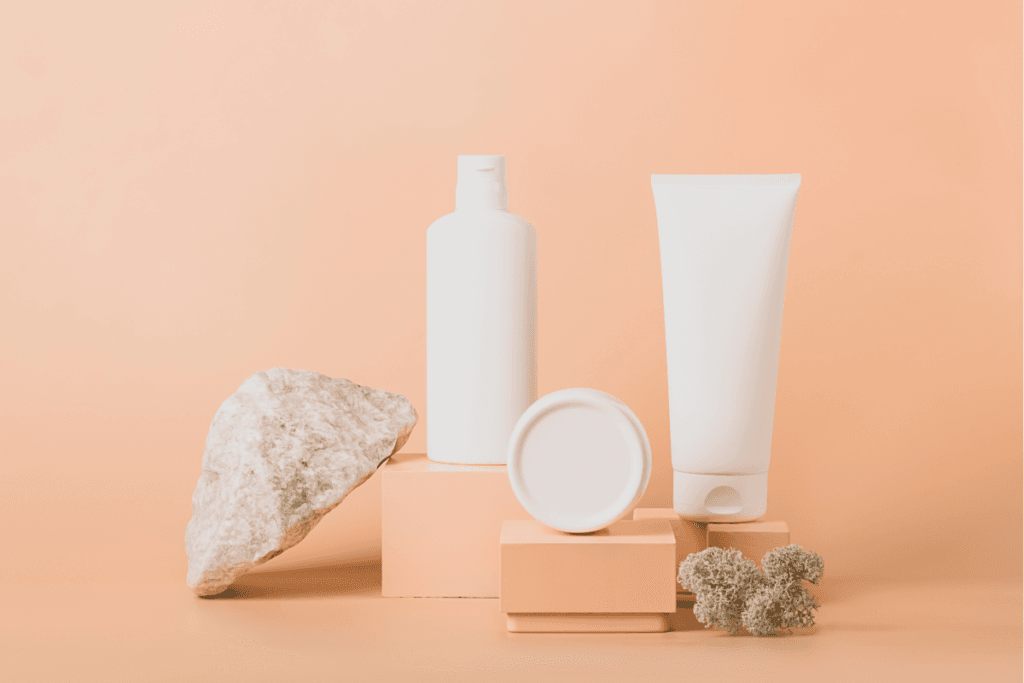 Minimal skincare routine setup with cleanser, moisturizer, and simple beauty products