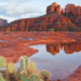 Iconic view of Cathedral Rock reflected in a water pool, Sedona, Arizona