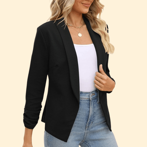 Classic black slim blazer styled with white top and high-waisted jeans