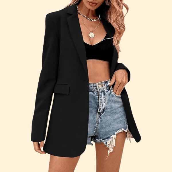 Casual black blazer styled with denim shorts and black crop top for a relaxed chic outfit