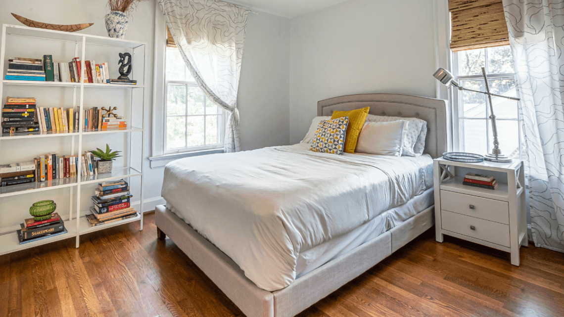 Organized small bedroom with minimalist storage ideas